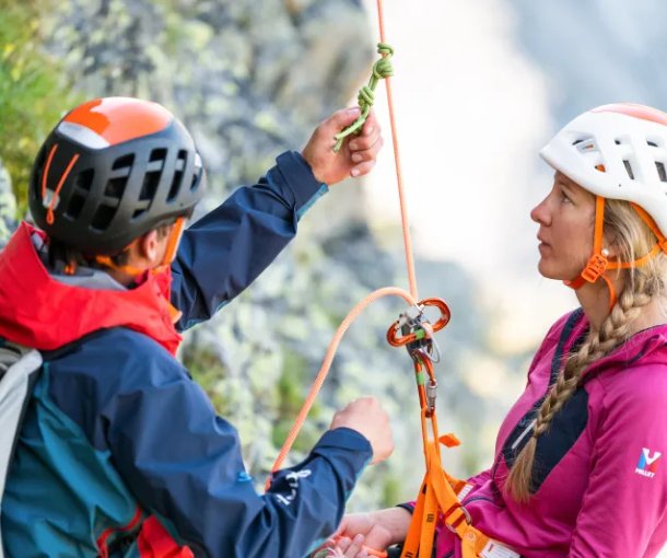 Climber practises rappelling