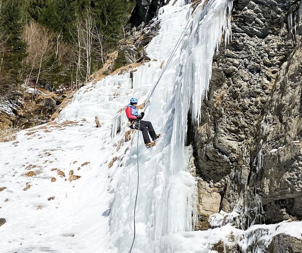 Person ice climbing