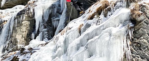 Person ice climbing