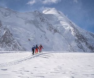 Ski tourers ascending on the glacier