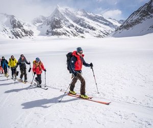 Ski tourers ascending on the glacier.