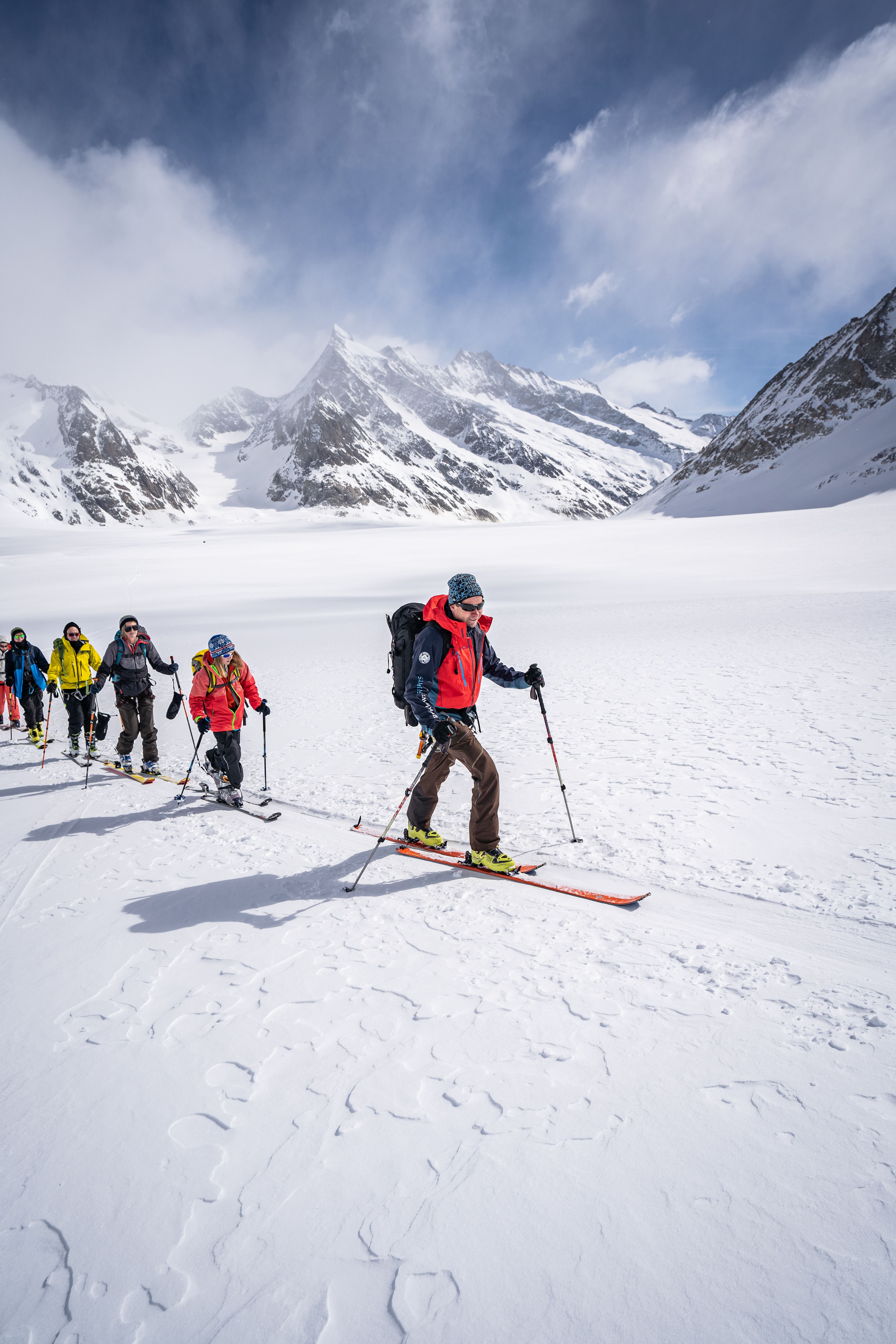 Ski tourers ascending on the glacier.