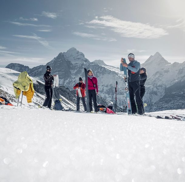 Ski tourers attach the skins to the skis.