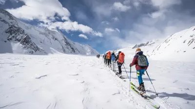 Ski tourers ascending to the Lötschenlücke.