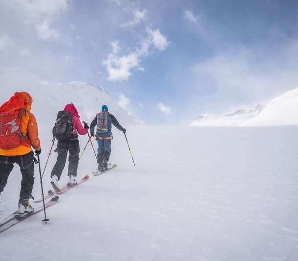 Ski tourers ascending to the Lötschenlücke.