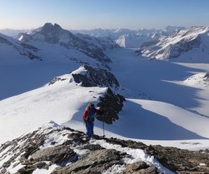 Ski tourers on the ridge of Trugberg.