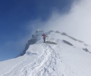 Ski tourers on ridge.
