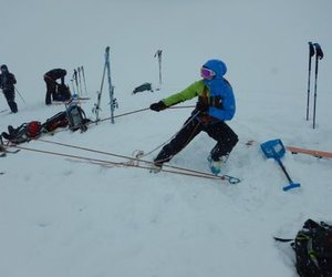 Ski tourer practices crevasse rescue.